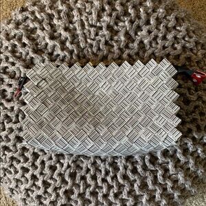 New Nahui Ollin Woven Clutch